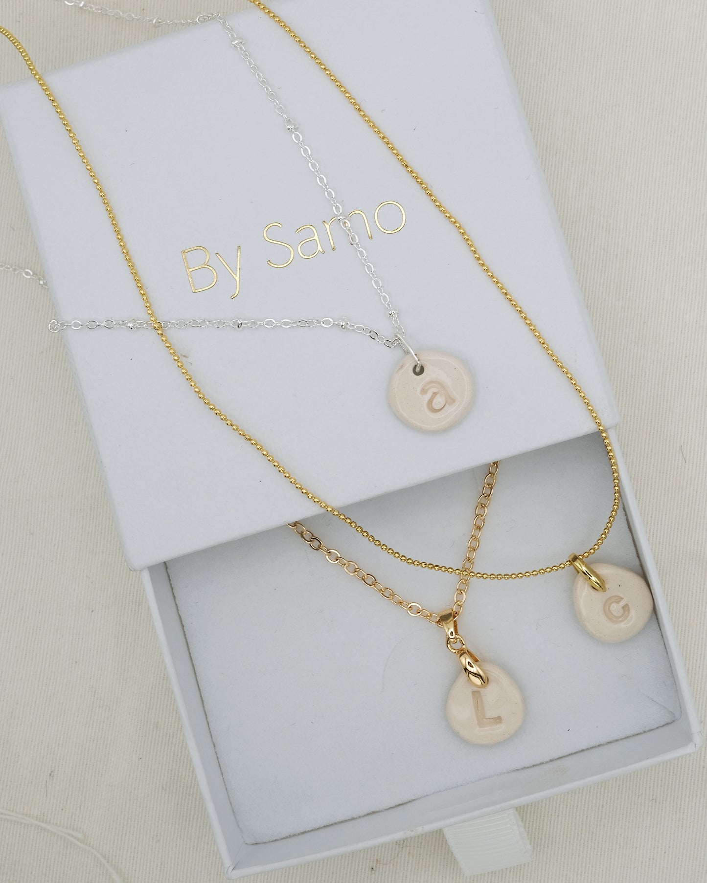AIRE LETTER NECKLACE