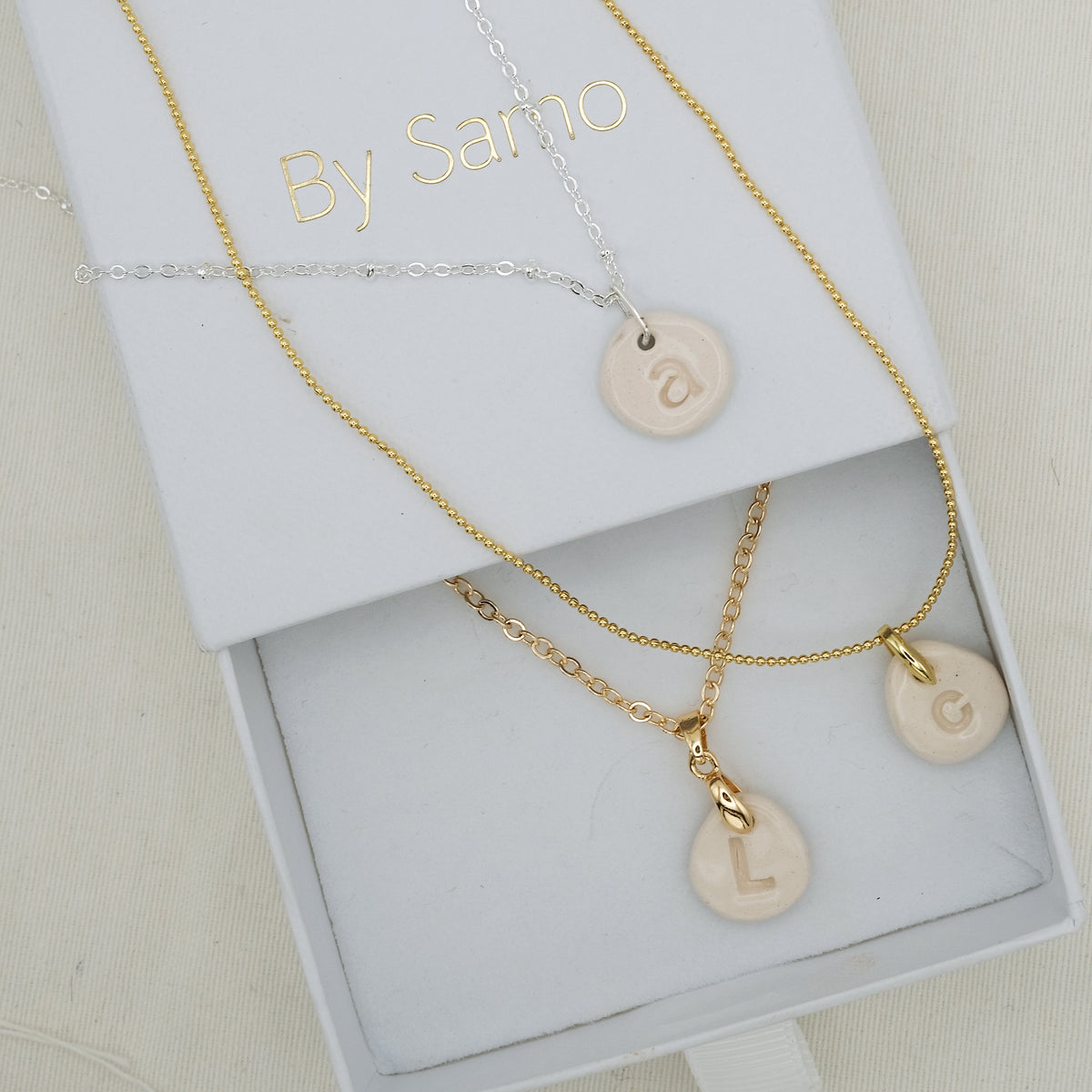 AIRE LETTER NECKLACE